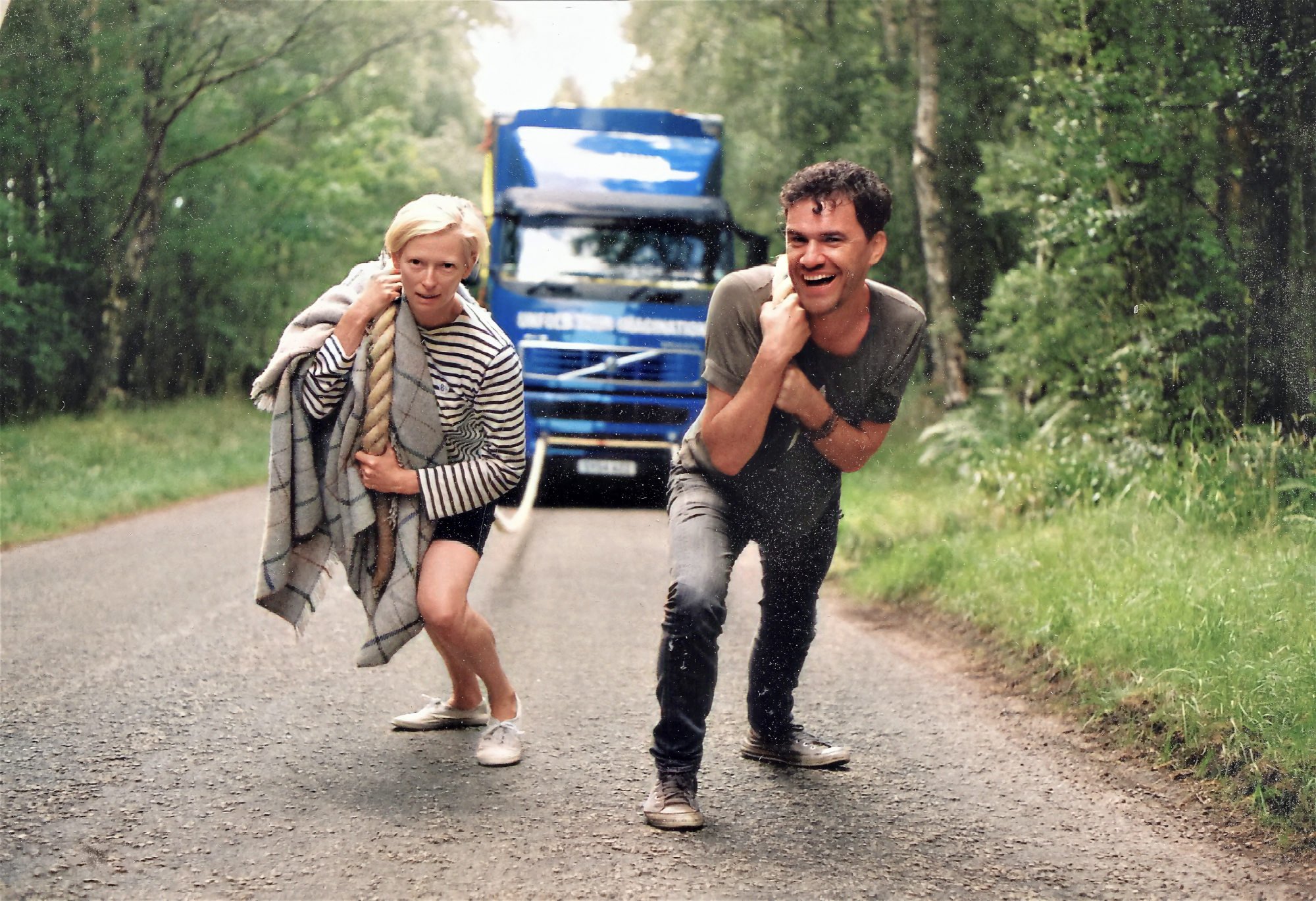 Tilda Swinton and Mark Cousins pulling a mobile cinema. Archive of Mark Cousins