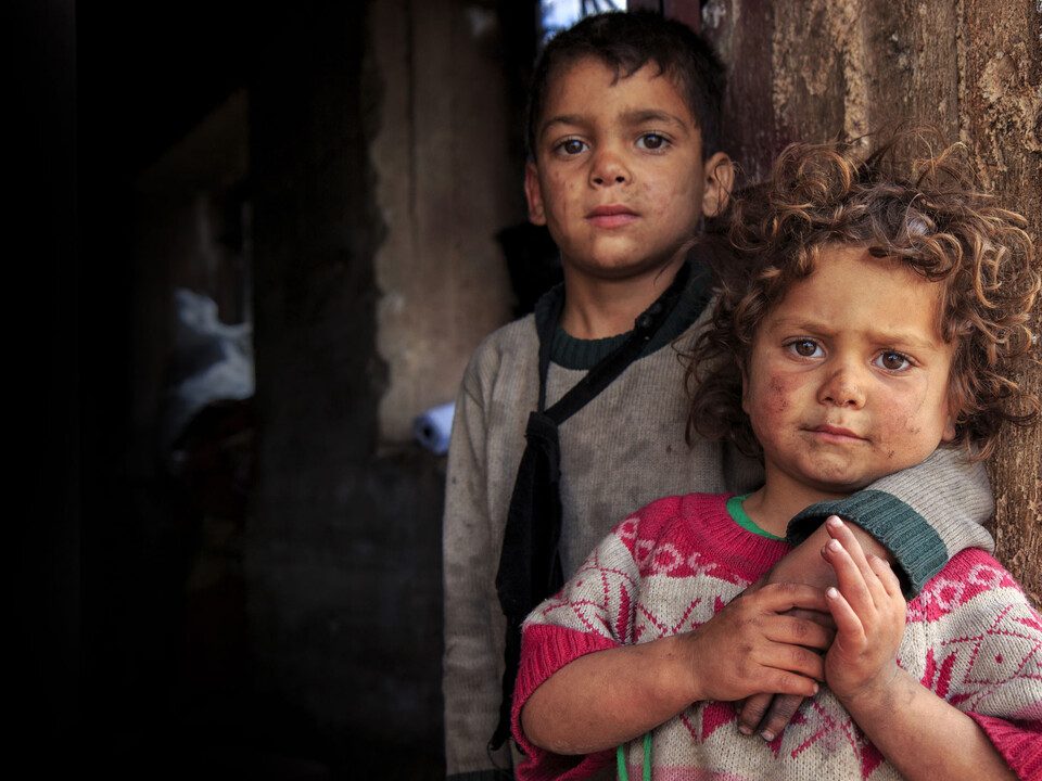 To hear children weeping in a photograph